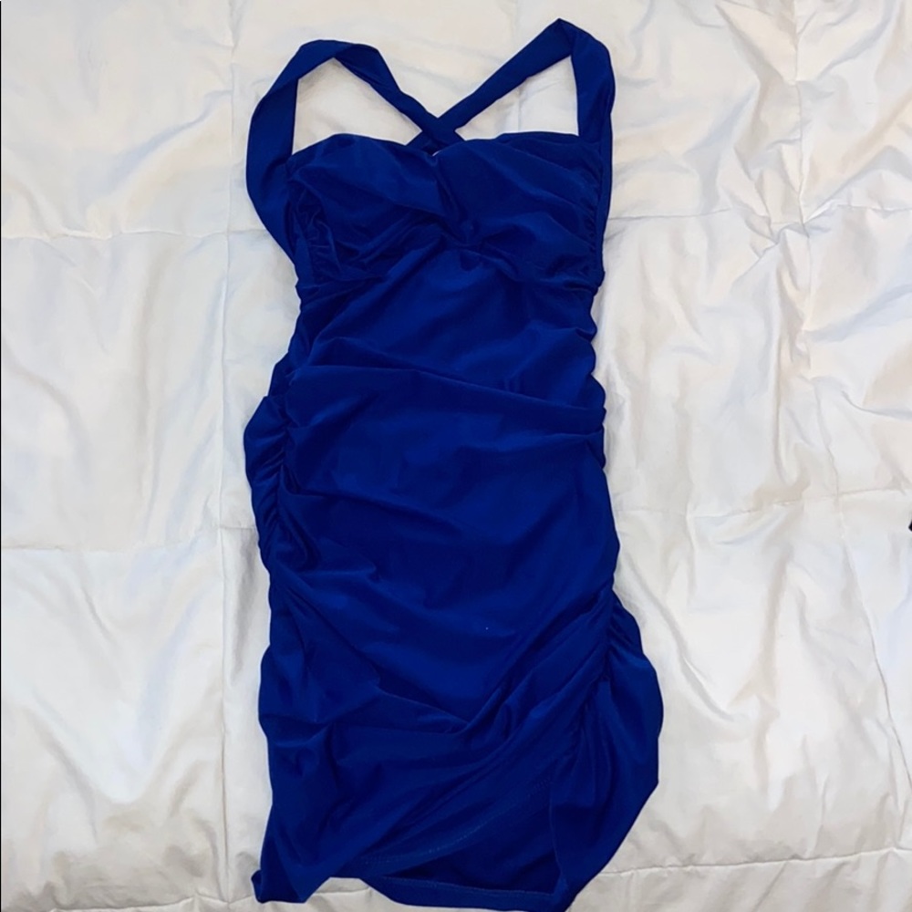 royal blue dress with singeing on the sides